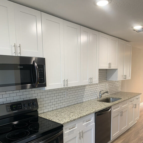 Restored kitchen after water damage repair in a Delray Beach condo